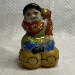 Vintage man Chinese porcelain figurine.